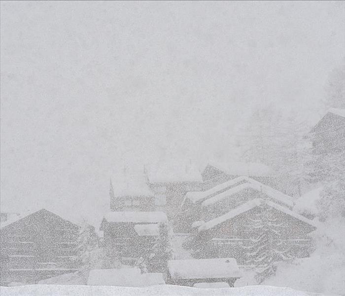 A heavy snowstorm in an Alpine Village